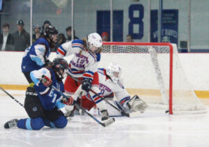 CCC Ice Hockey Players Taking the puck to the Net - 4 Players 2 on 2
